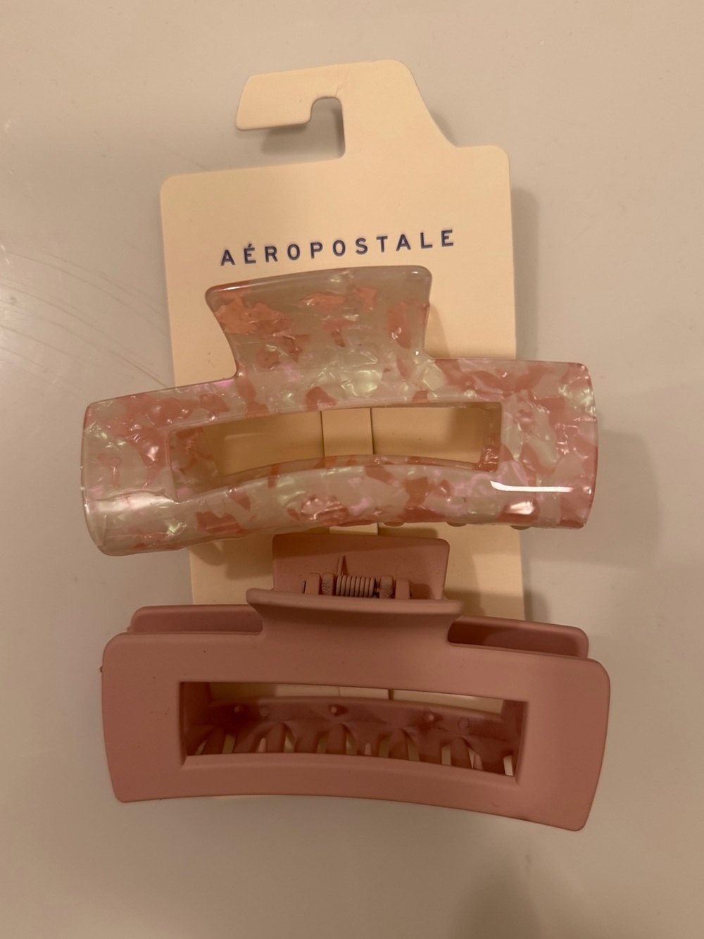 BNWT pink & marble design claw clips